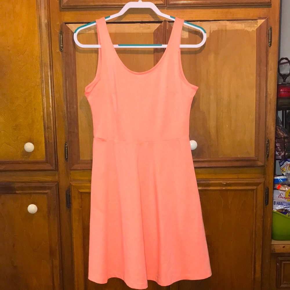 Flirty coral dress. Fun for summer and very form flattering for all body types